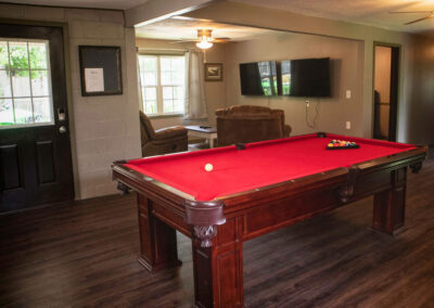 Men's Quarters Pool Table and Den